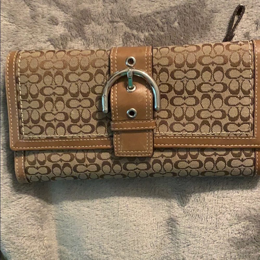 Coach wallet matching purse also available.